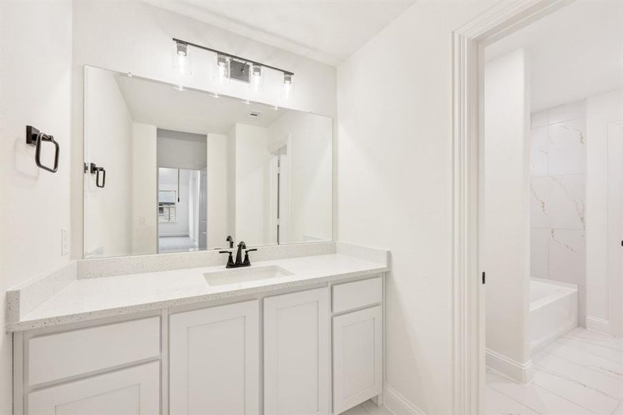 Furnished interior view inside a new home in Windsong Ranch Classic 61, Prosper (Image 19).