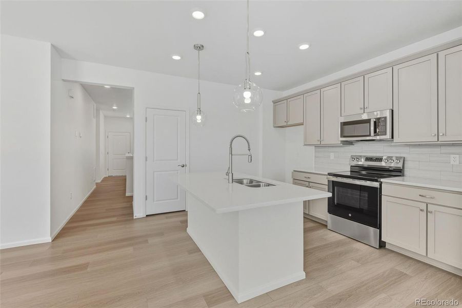 Furnished interior view inside a new home in The Cottages Collection at Ridgeline Vista, Brighton (Image 5).