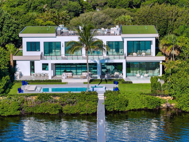 Front exterior of a new home in , Lantana, FL, highlighting curb appeal (Image 1).