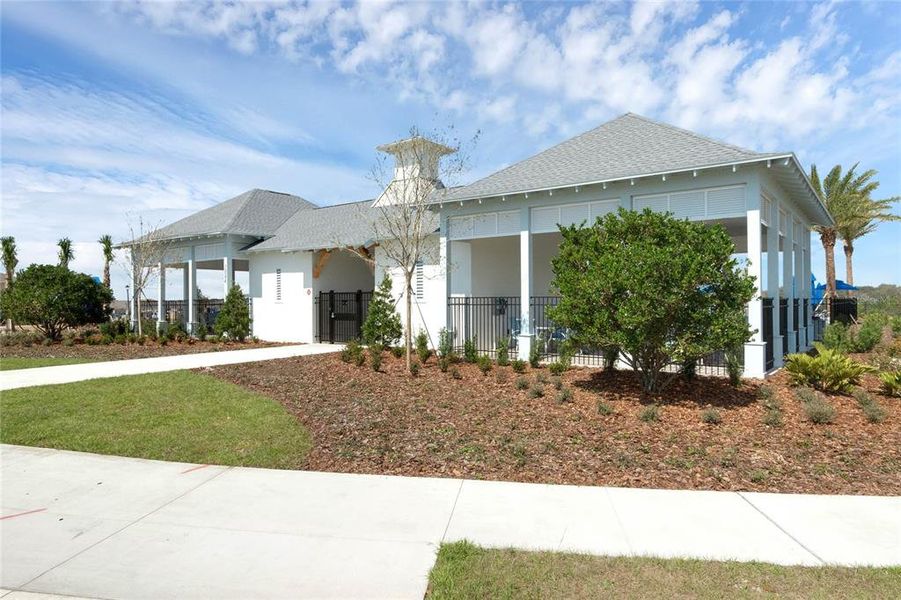 Front exterior of a new home in Avalon Park Tavares Single Family Homes, Tavares, FL, highlighting curb appeal (Image 1).