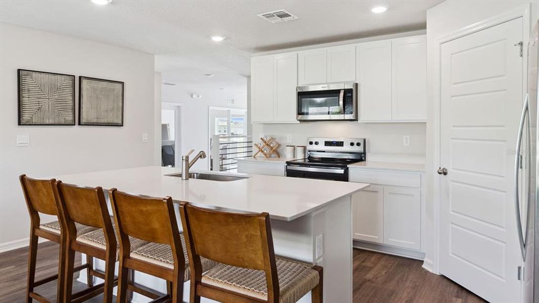 Furnished interior view inside a new home in Bradbury Creek, Haines City (Image 2).