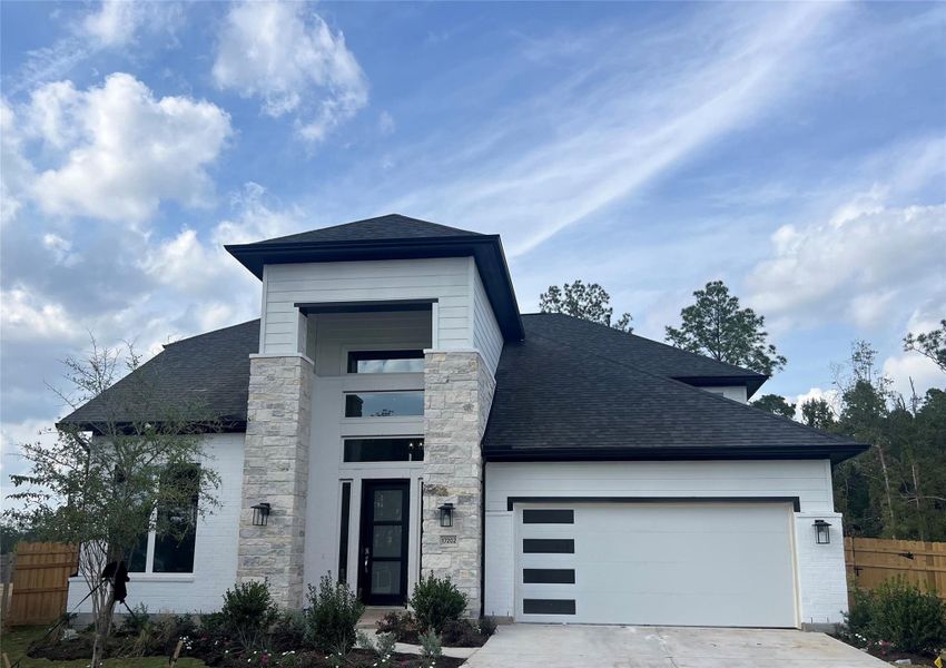Front exterior of a new home in ARTAVIA 55' Lots, Conroe, TX, highlighting curb appeal (Image 27). Front exterior of a new home in ARTAVIA 55' Lots, Conroe, TX, highlighting curb appeal (Image 27).