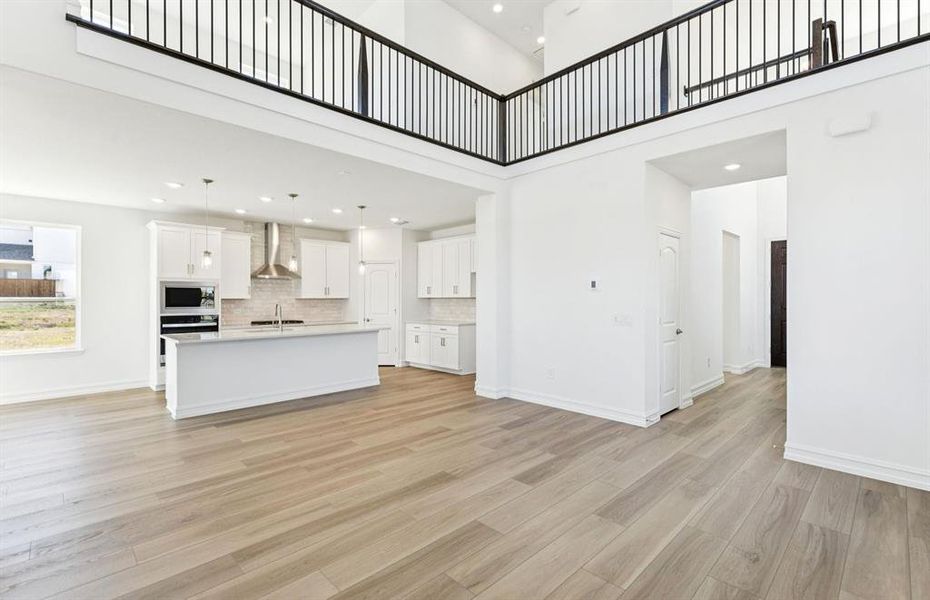 Airy gathering room showcases open concept floorplan Airy gathering room showcases open concept floorplan