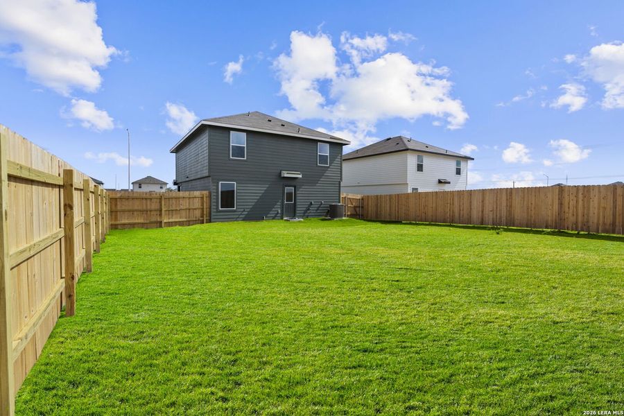 Exterior details and patio area of a home in Swenson Heights, Seguin (Image 4).
