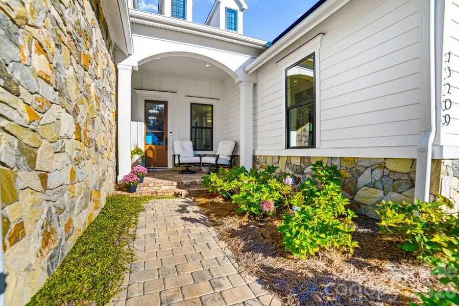 Exterior details and patio area of a home in , Huntersville (Image 3).