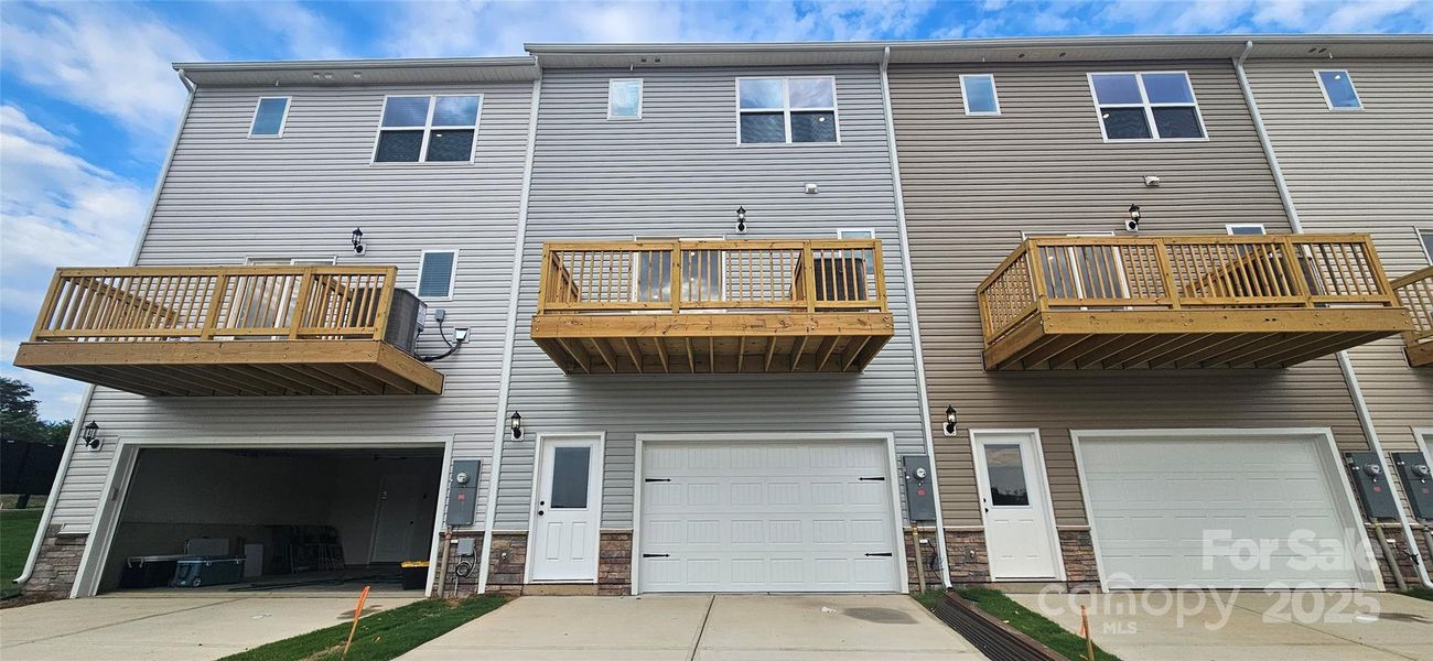 Front exterior of a new home in Rhyne Court, Gastonia, NC, highlighting curb appeal (Image 2). Front exterior of a new home in Rhyne Court, Gastonia, NC, highlighting curb appeal (Image 2).
