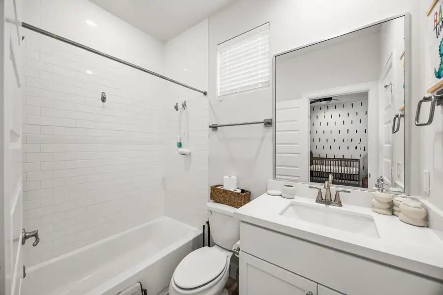 Furnished interior view inside a new home in The Corner At Buffalo Pointe, Houston (Image 10).