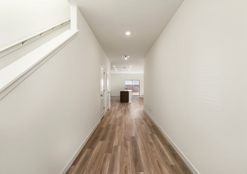 A spacious entry way welcomes you and guests inside.