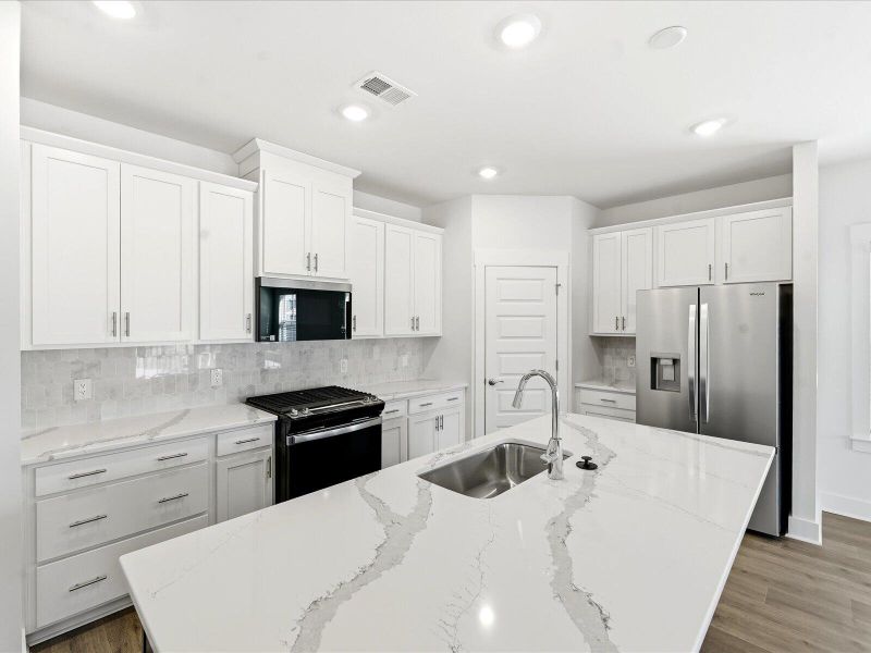 Furnished interior view inside a new home in The Coves at Lakes of Cane Bay II, Summerville (Image 9).