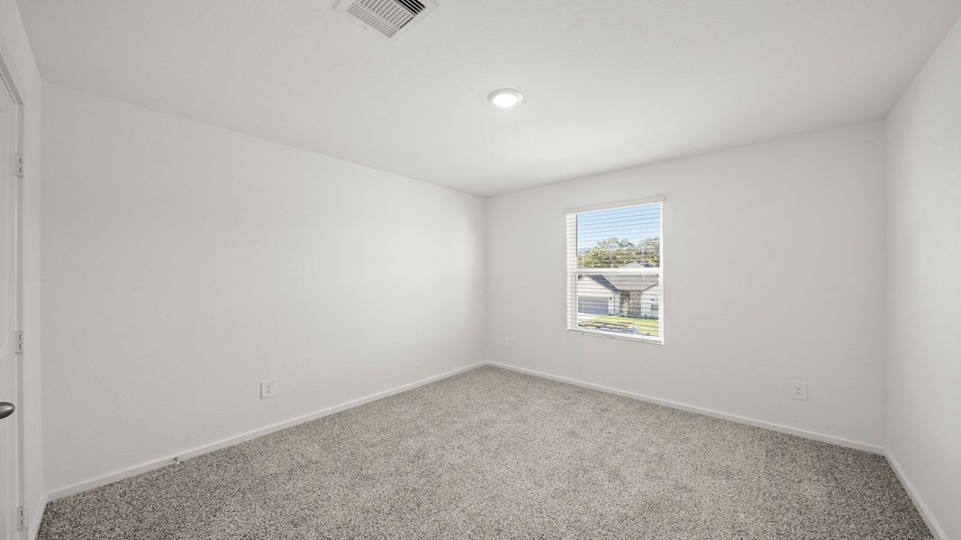 Representative unfurnished interior of a home built from the Dawson by D.R. Horton in Lexington Heights, Willis (Image 23).