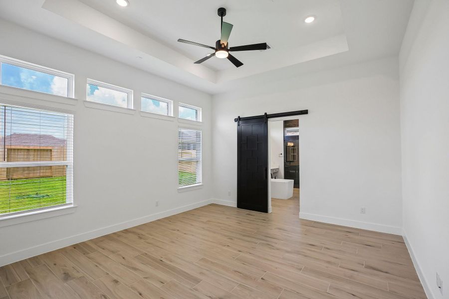 Spacious, unfurnished interior of a new home in Riceland 60',65',70', Old River-Winfree (Image 37).