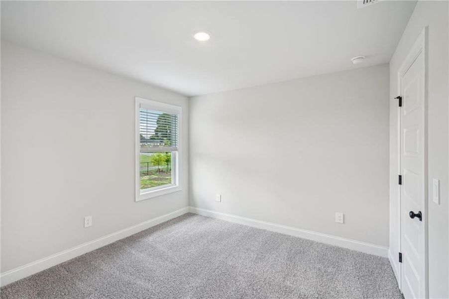Spacious, unfurnished interior of a new home in Martin Springs - Estate Series, Lawrenceville (Image 26).