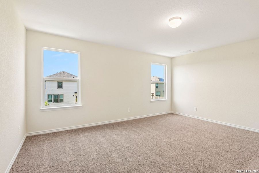 Spacious, unfurnished interior of a new home in Woodside Farms, Seguin (Image 42).
