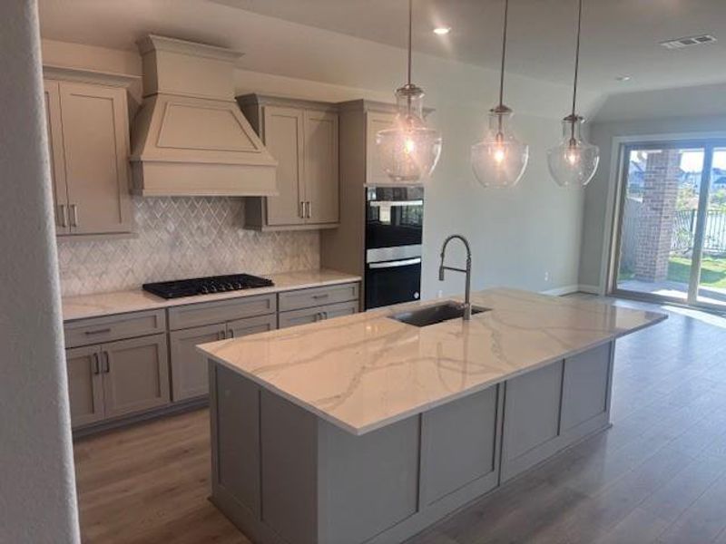 Furnished interior view inside a new home in Del Bello Lakes 60', Manvel (Image 5). Furnished interior view inside a new home in Del Bello Lakes 60', Manvel (Image 5).