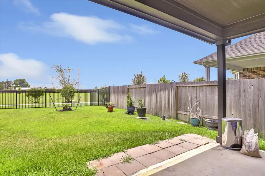 Exterior details and patio area of a home in , Tomball (Image 3). Exterior details and patio area of a home in , Tomball (Image 3).