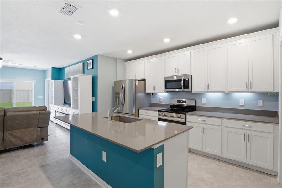 Furnished interior view inside a new home in Wellness Ridge, Clermont (Image 9).