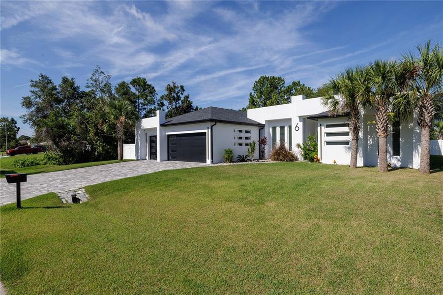 Front exterior of a new home in , Palm Coast, FL, highlighting curb appeal (Image 29).