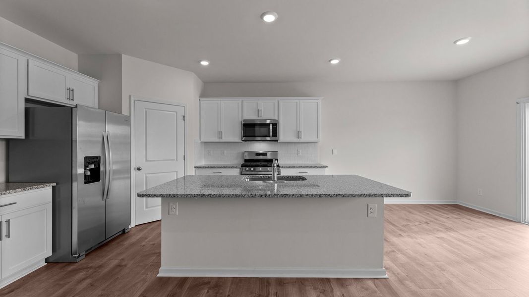 Furnished interior view inside a new home in Beaver Dam Crossing, Bailey (Image 7).