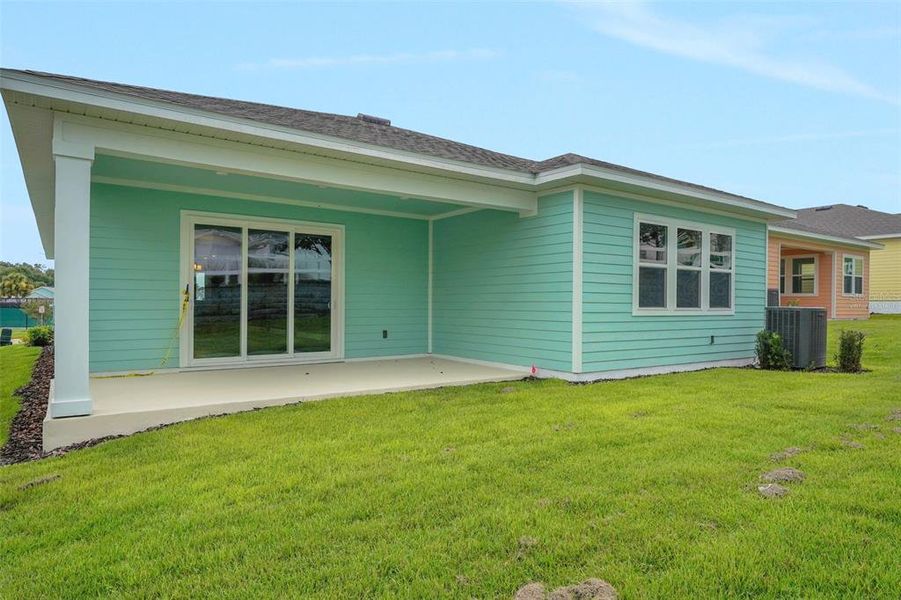 Exterior details and patio area of a home in Green Key Village, Lady Lake (Image 2). Exterior details and patio area of a home in Green Key Village, Lady Lake (Image 2).