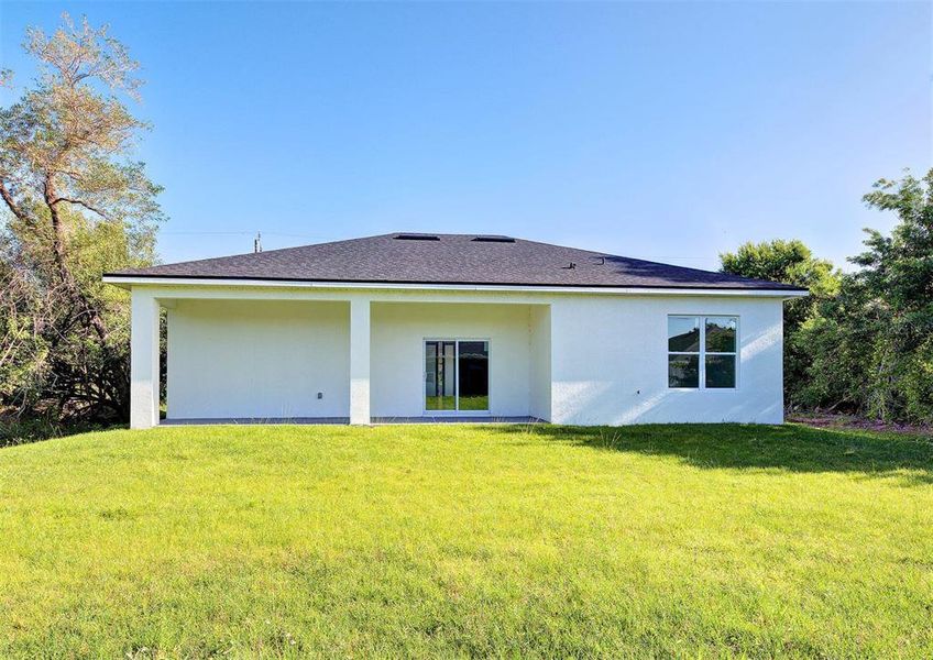 Exterior details and patio area of a home in , Rotonda West (Image 28).