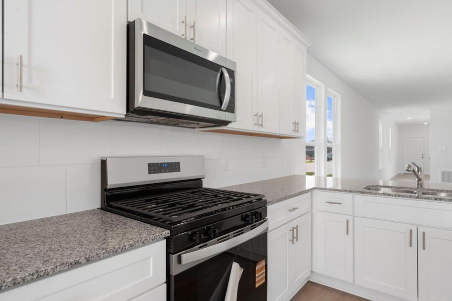 Furnished interior view inside a new home in Peppervine, Porter (Image 5).