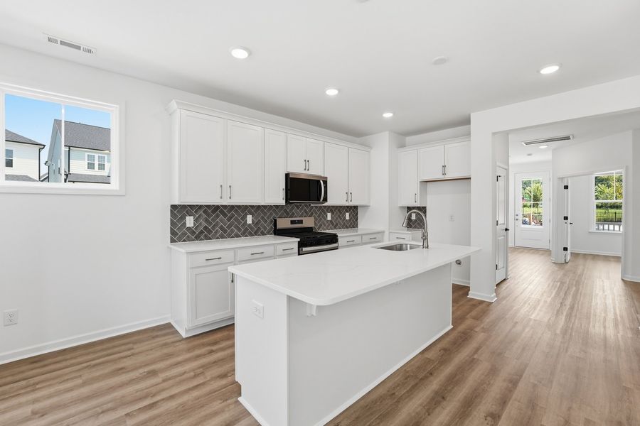 Representative furnished interior of a home built from the Blair by Brookfield Residential in Wendell Falls, Wendell (Image 5).