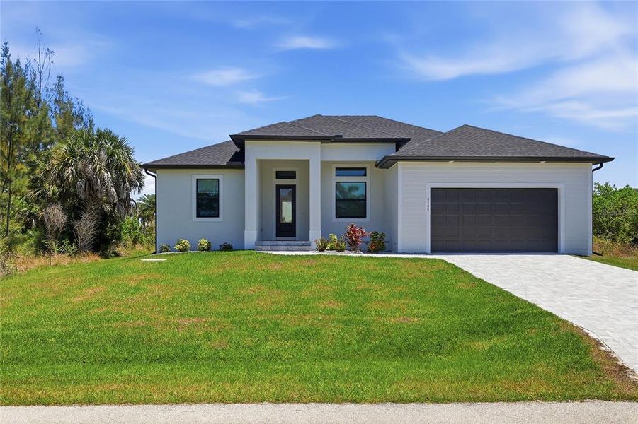 Front exterior of a new home in , Port Charlotte, FL, highlighting curb appeal (Image 21).