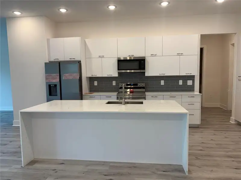 Furnished interior view inside a new home in , Port Charlotte (Image 4).