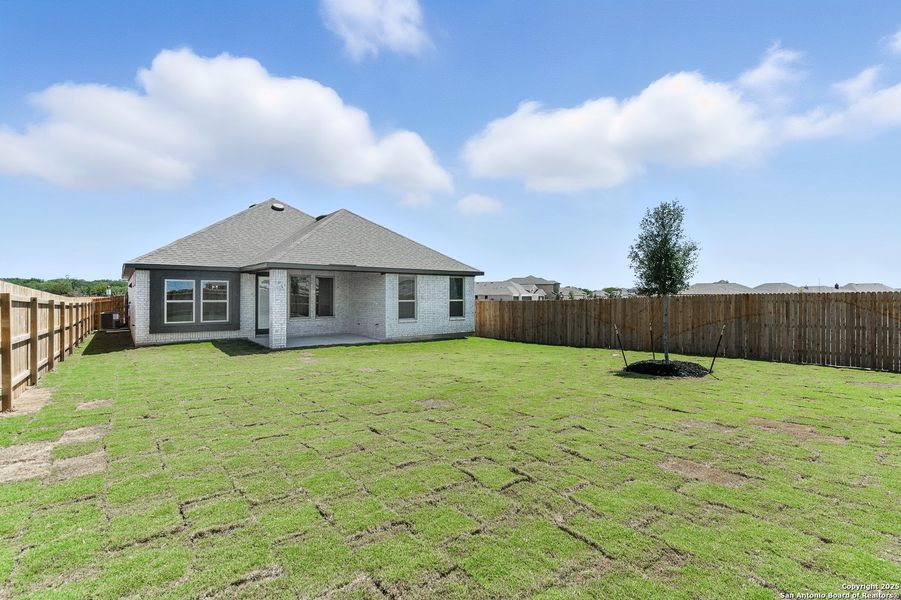 Front exterior of a new home in Alsatian Oaks, Castroville, TX, highlighting curb appeal (Image 23).