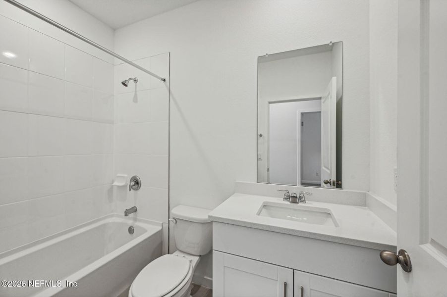 Furnished interior view inside a new home in Lakes at Bella Lago - Signature Series, Green Cove Springs (Image 9).