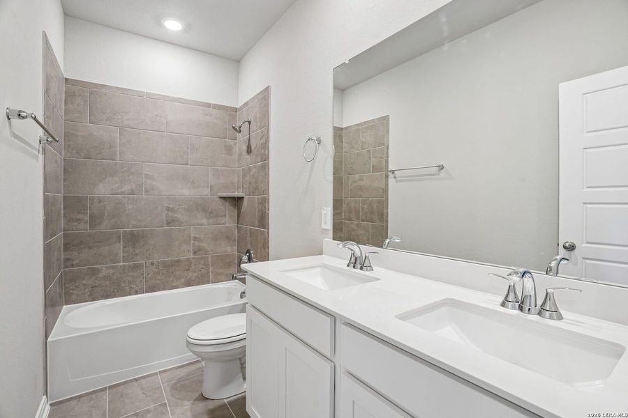 Furnished interior view inside a new home in Legendary Trails - Premier Series, Cibolo (Image 9).