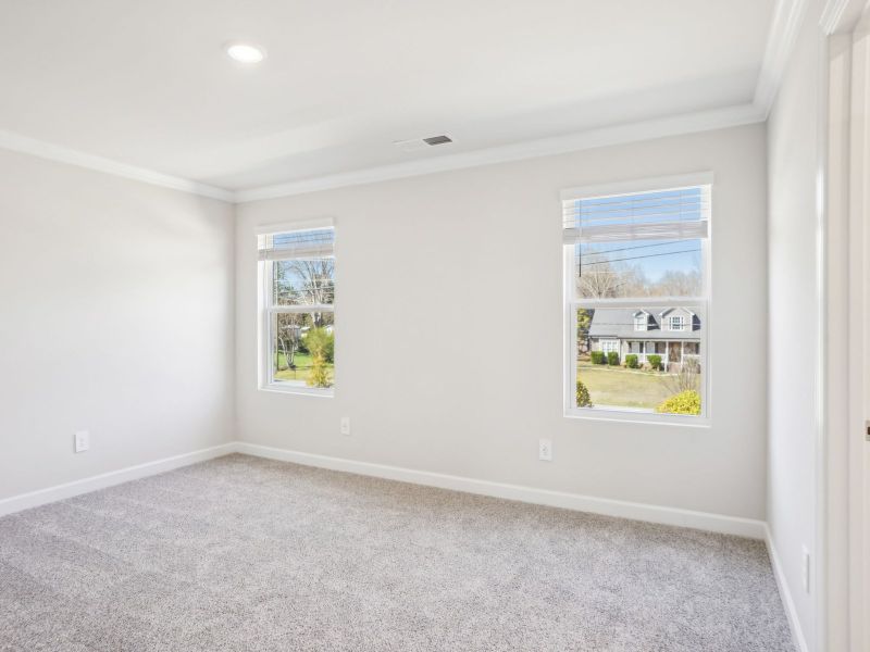The primary bedroom provides the right amount of natural light.