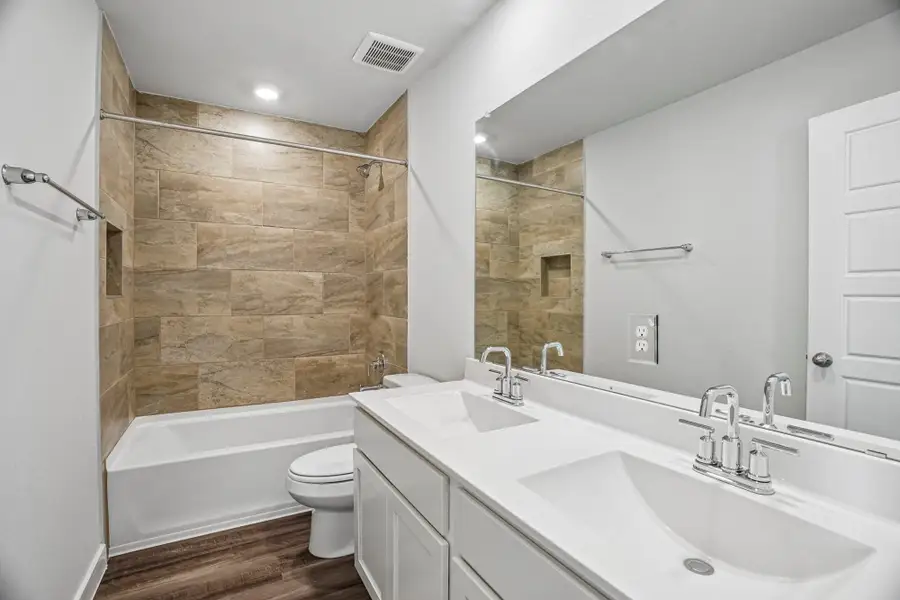 Furnished interior view inside a new home in The Meadows at Hunters Ranch, San Antonio (Image 11).