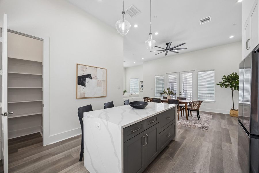 The large walk in pantry and extra storage in the island mean plenty of storage for all your cooking needs. The large walk in pantry and extra storage in the island mean plenty of storage for all your cooking needs.