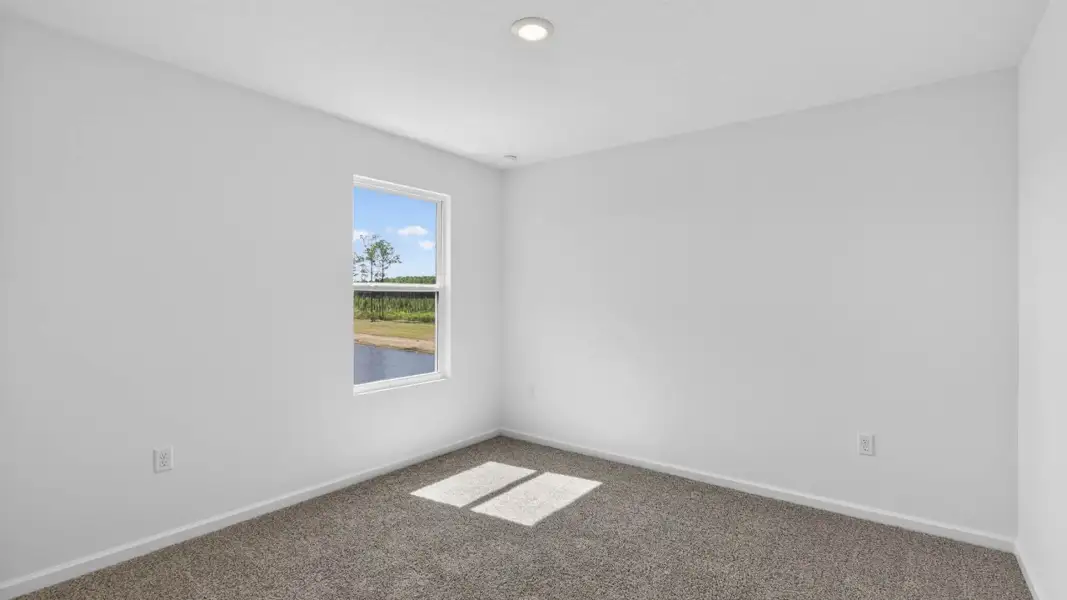 Spacious, unfurnished interior of a new home in The Arbors, Jacksonville (Image 25).