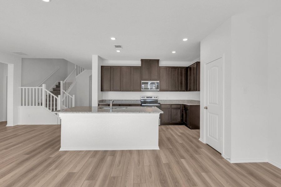 Furnished interior view inside a new home in Mustang Valley, Manor (Image 10). Furnished interior view inside a new home in Mustang Valley, Manor (Image 10).