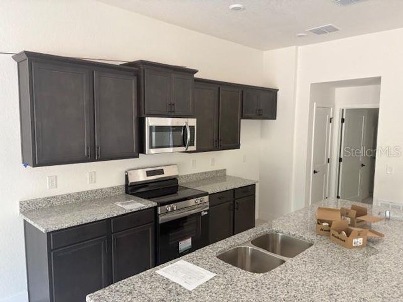 Furnished interior view inside a new home in , Dunnellon (Image 3).