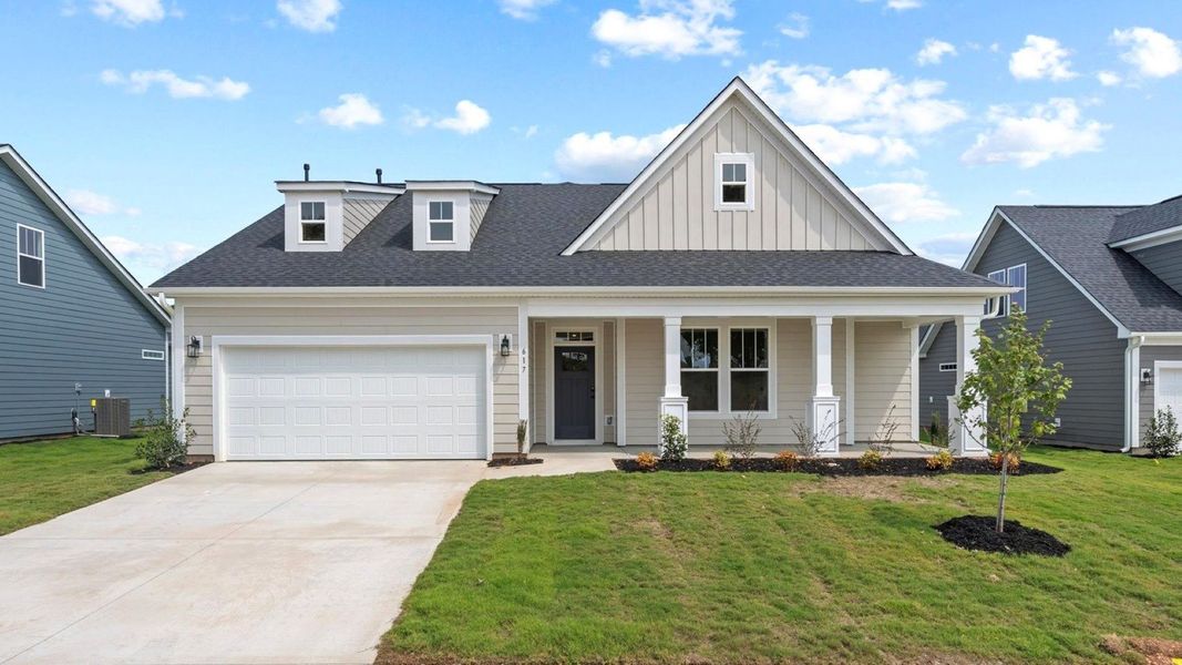 Representative exterior photo of a completed home built from the Wakefield by DRB Homes in Benjamin's Grove, Woodruff, SC (Image 21). Representative exterior photo of a completed home built from the Wakefield by DRB Homes in Benjamin's Grove, Woodruff, SC (Image 21).