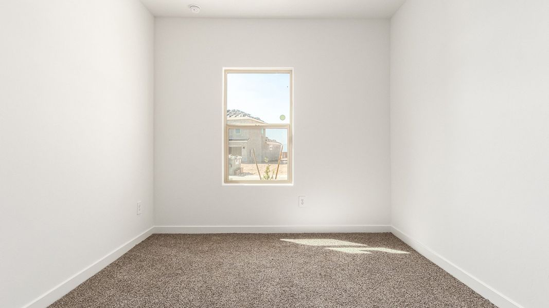 Representative unfurnished interior of a home built from the Baxter by D.R. Horton in The Oasis at Rocking K, Vail (Image 32).