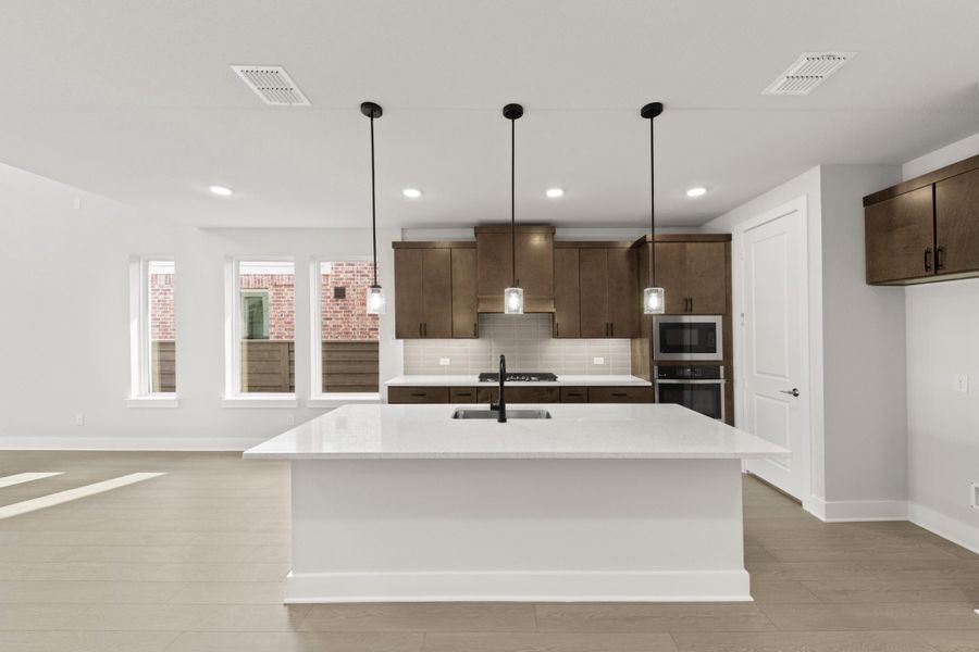 Furnished interior view inside a new home in Garden Collection at Union Park, Little Elm (Image 3).