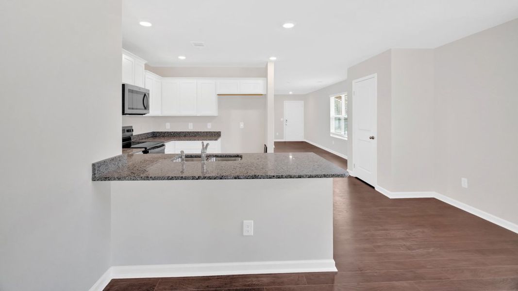 Representative furnished interior of a home built from the Allex by D.R. Horton in Clearwater Springs, Johnson City (Image 6). Representative furnished interior of a home built from the Allex by D.R. Horton in Clearwater Springs, Johnson City (Image 6).