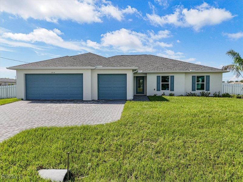 Front exterior of a new home in Cape Coral, Cape Coral, FL, highlighting curb appeal (Image 2).