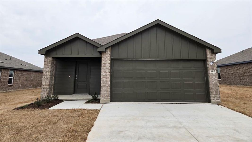Front exterior of a new home in Leonard Crossing, Leonard, TX, highlighting curb appeal (Image 1). Front exterior of a new home in Leonard Crossing, Leonard, TX, highlighting curb appeal (Image 1).