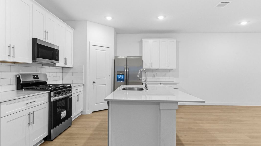 Furnished interior view inside a new home in Lakes at Westland Ranch, League City (Image 6).