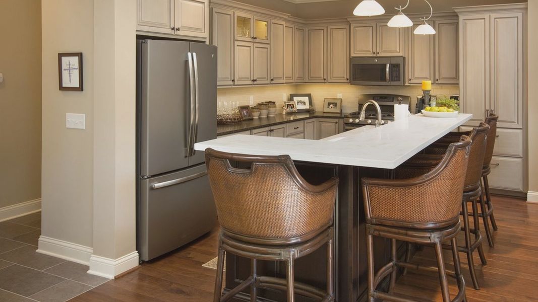 Representative furnished interior of a home built from the Portico + by Perfection Builders in The Courtyards at Oakland Hills, Louisville (Image 7).