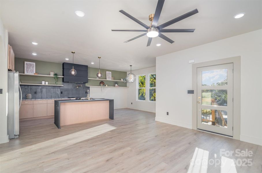 Kitchen and living area Kitchen and living area