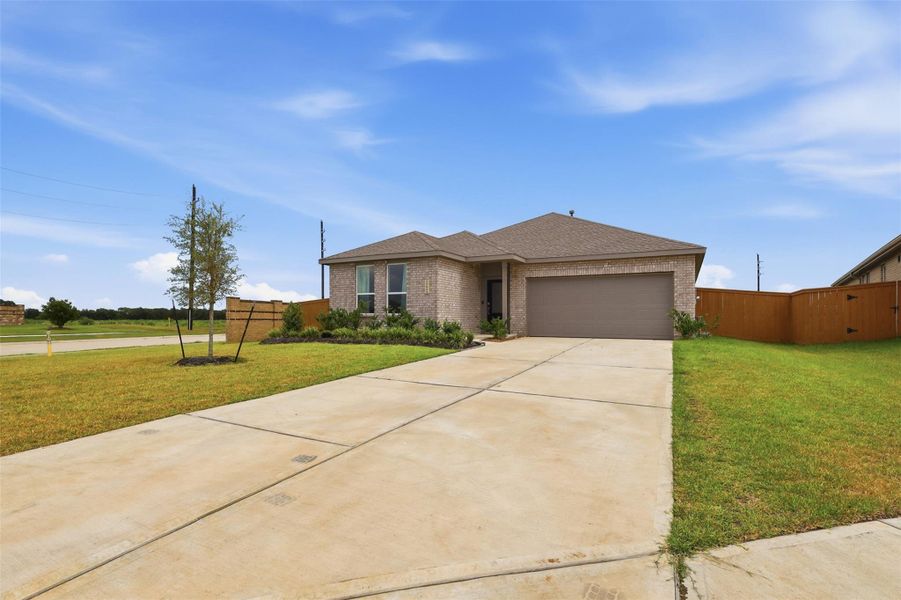 Front exterior of a new home in Emberly, Beasley, TX, highlighting curb appeal (Image 2). Front exterior of a new home in Emberly, Beasley, TX, highlighting curb appeal (Image 2).