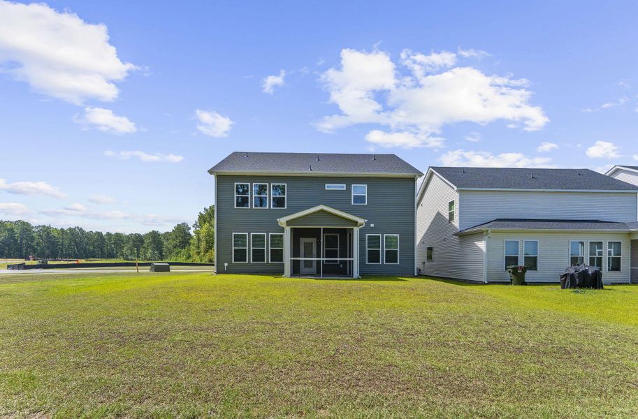 Exterior details and patio area of a home in The Groves of Berkeley, Moncks Corner (Image 27).