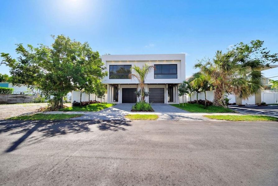 Front exterior of a new home in , Fort Lauderdale, FL, highlighting curb appeal (Image 30).