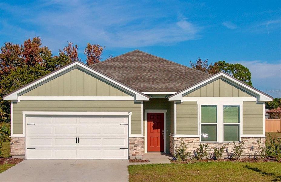 Front exterior of a new home in , Palm Coast, FL, highlighting curb appeal (Image 24).